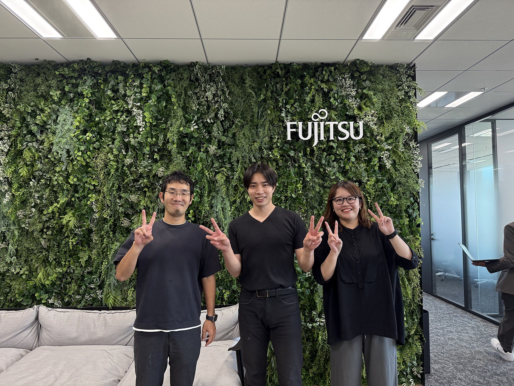 At Fujitsu headquarters: Mr. Matsumura, Kawashima, and Ms. Sakaguchi